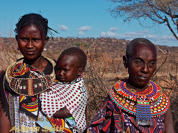 Samburu Generations: elder woman, new mother and child