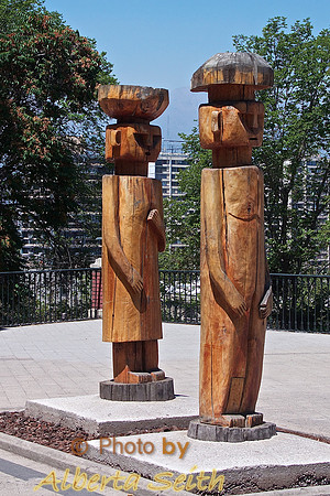 Carved wooden statues Bid Adios as We Leave the Cerro Santa Lucía Gardens in Downtown Santiago